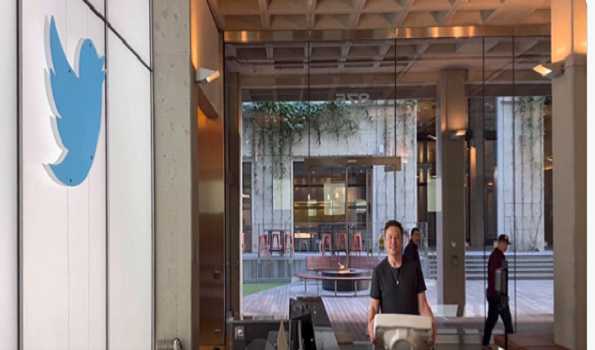 Musk visits Twitter HQ carrying sink as deal looms