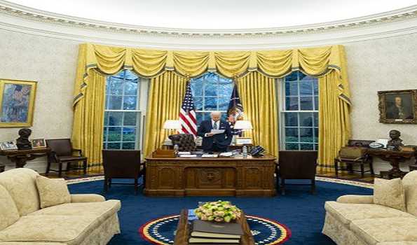 Biden signs bill to avert US govt shutdown through Dec 30