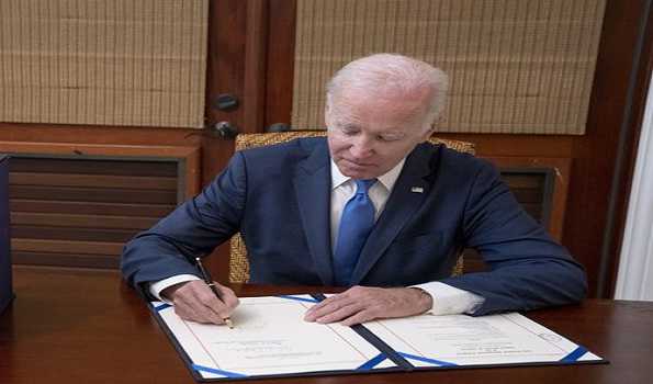 Biden says signed $1.7 trillion government spending bill