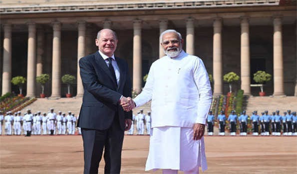 German Chancellor arrives in India, to hold talks with PM Modi