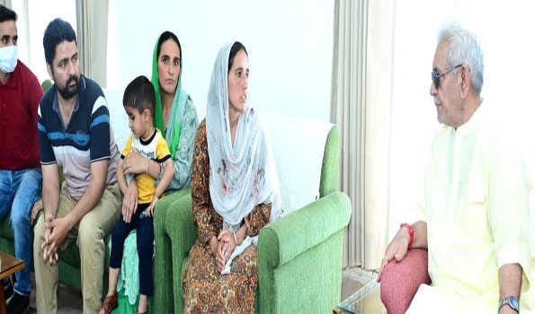 J&K LG meets family members of martyr Sanjay Sharma