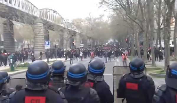 Paris police use batons to disperse pension reform protesters