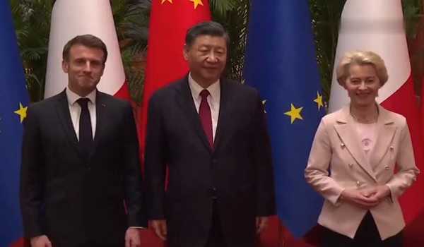 Xi, Macron hold informal meeting in China