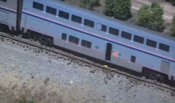 16 injured when passenger train hits truck, partially derails in U.S. California