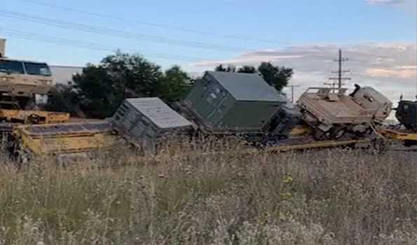 Train carrying military equipment derails in U.S. Colorado