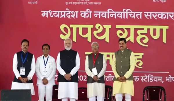 Yadav sworn in as MP CM, Modi attends ceremony