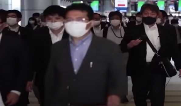 Japan to scrap public aid for COVID-19 treatment