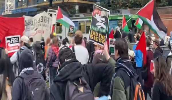 Thousands protesters rally outside Australia defence industry expo