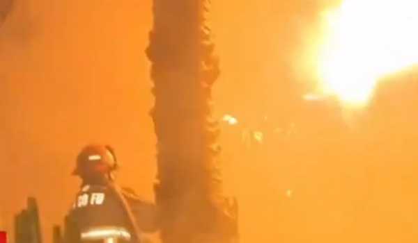 Firefighters continue to contain wildfires in Southern California as winds fade